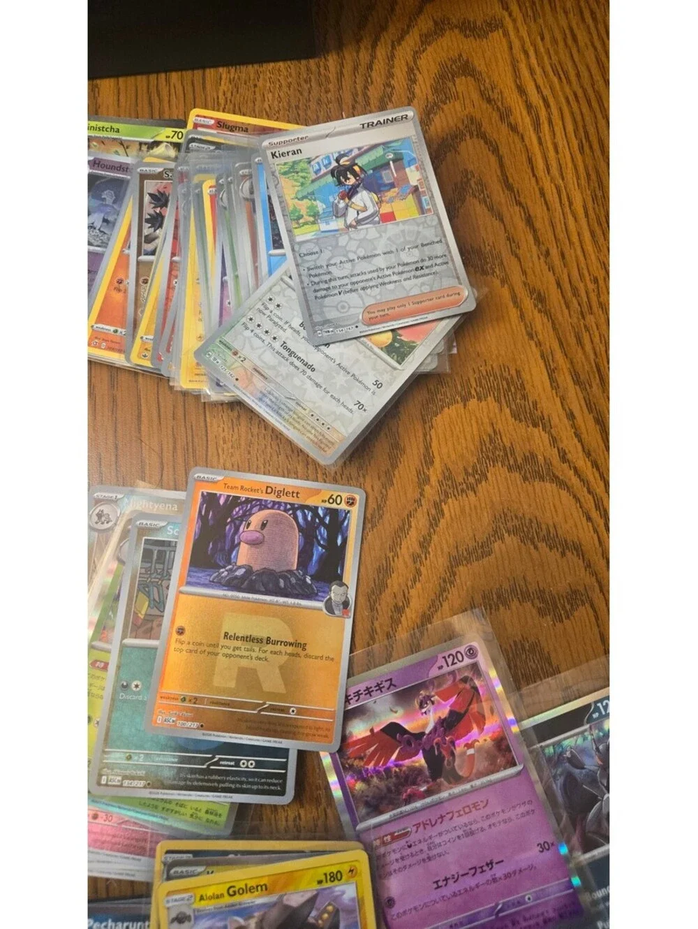 Bulk Lot of Mixed Pokemon Trading Cards with Sleeves and Storage Box